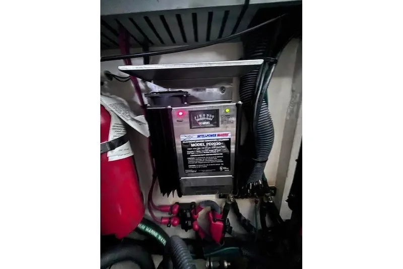 Slide: The Image of Electrical panel and fire extinguisher in 2006 Sea Ray Sundancer 320 boat. - 35