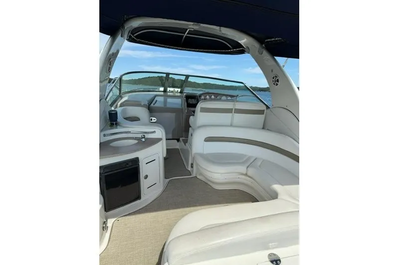 Slide: The Image of Interior view of 2006 Sea Ray Sundancer 320 boat with seating and helm. - 4