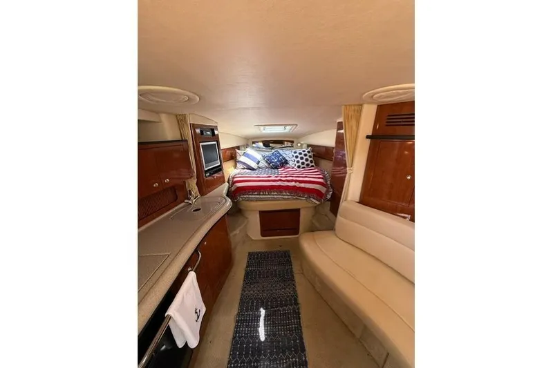 Slide: The Image of Interior of 2006 Sea Ray Sundancer 320 with cozy cabin and stylish furnishings. - 8