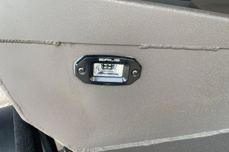 Slide: The Image of Close-up of Sirius light on 2026 Reaper Boats 653 Timber Reaper. - 10