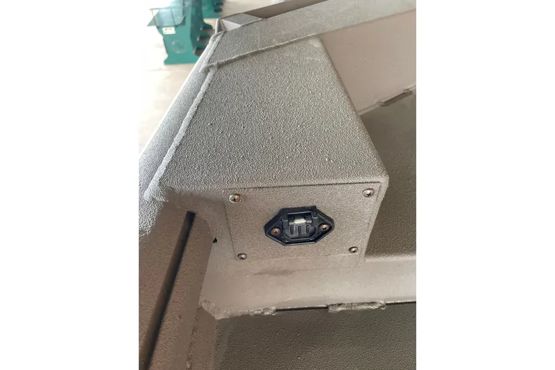 Slide: The Image of Close-up of 2026 Reaper Boats 653 Timber Reaper's textured surface and electrical outlet. - 11