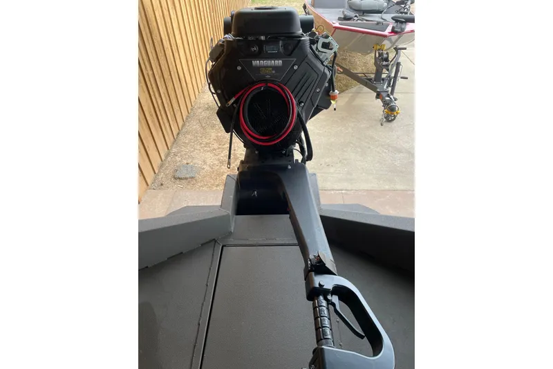 Slide: The Image of 2026 Reaper Boats 653 Timber Reaper with Vanguard engine, viewed from the rear. - 4