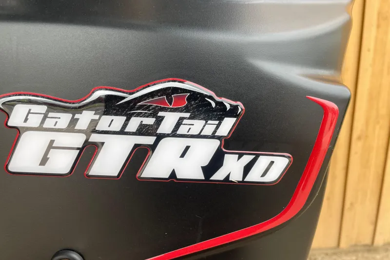 Slide: The Image of Close-up of GatorTail GTR XD logo on 2026 Reaper Boats 653 Timber Reaper. - 8