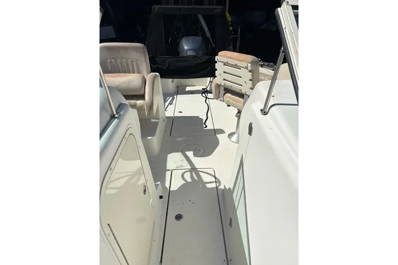 Slide: The Image of 2009 Hydra-Sports 2200 DC boat interior with seating and outboard motor. - 6