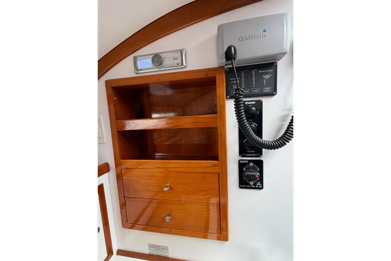Slide: The Image of Wooden cabinet with Garmin marine electronics on a 2001 Bluestar BlueStar 29.9 boat. - 22