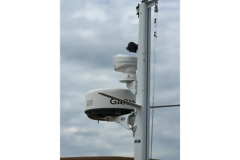 Slide: The Image of Radar equipment on a Bluestar BlueStar 29.9 boat, 2001 model, under cloudy skies. - 40