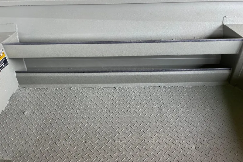 Slide: The Image of Interior view of 2026 Reaper Boats 553 Timber Reaper with textured flooring. - 7