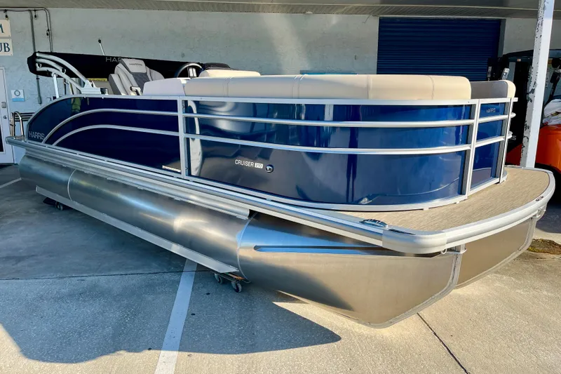 The Image of 2026 Harris Cruiser 210 pontoon boat in blue and silver. - 0