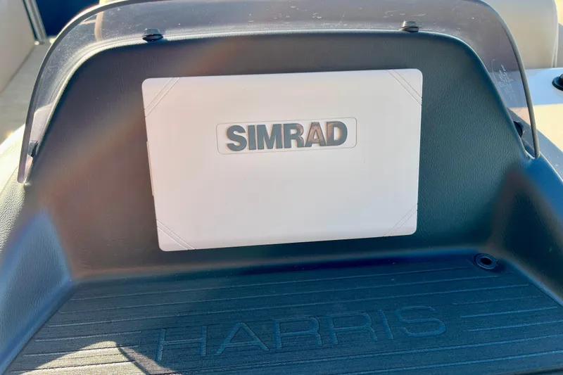 Slide: The Image of Simrad device on Harris Cruiser 210, year 2026. - 10