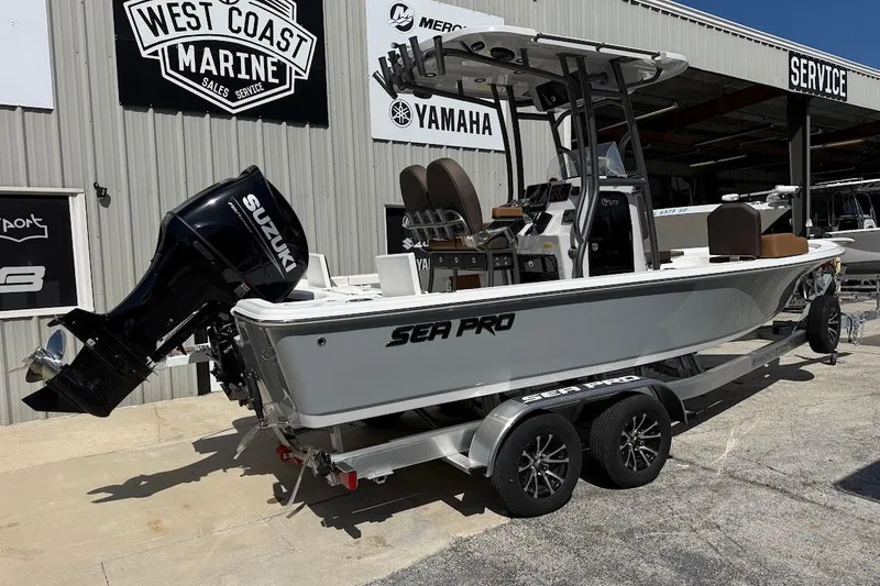 Slide: The Image of 2026 Sea Pro 230 Bay boat with Suzuki engine at West Coast Marine dealership. - 10