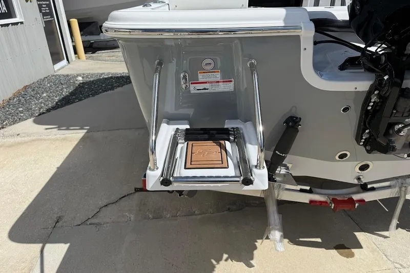 Slide: The Image of 2026 Sea Pro 230 Bay boat stern with swim platform and ladder. - 12