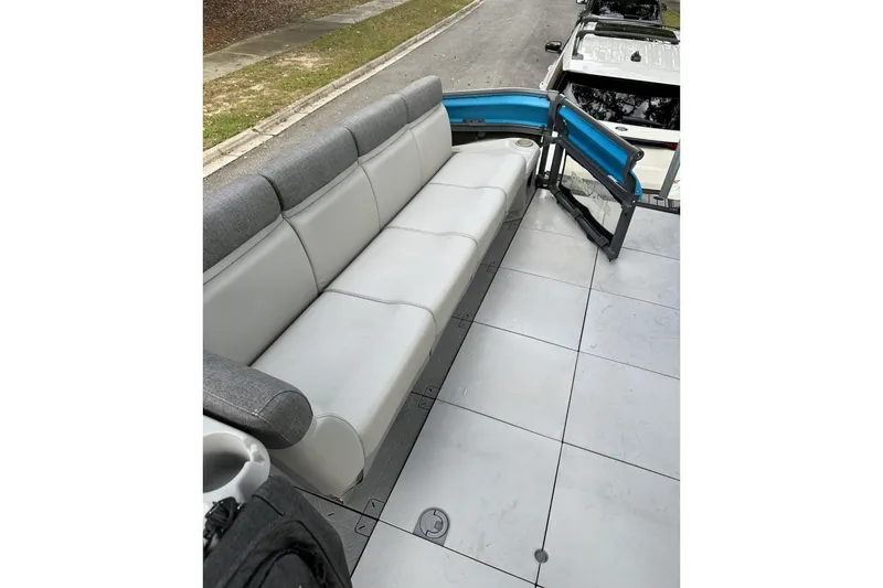 Slide: The Image of 2023 Bombardier Sea Doo with spacious seating and modern design on a trailer. - 13