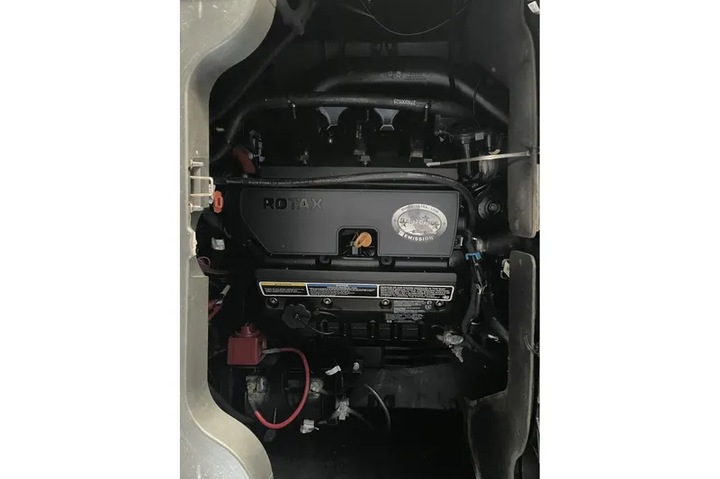 Slide: The Image of 2023 Bombardier Sea Doo engine compartment showcasing Rotax engine components. - 17
