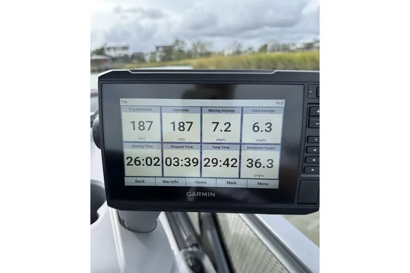 Slide: The Image of Garmin display on 2023 Bombardier Sea Doo showing trip statistics and speed data. - 9