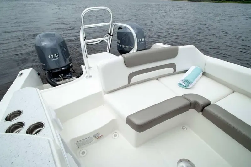 Slide: The Image of Manufacturer Provided Image: 2026 World Cat 230 SD boat with dual engines and comfortable seating on the water. - 16