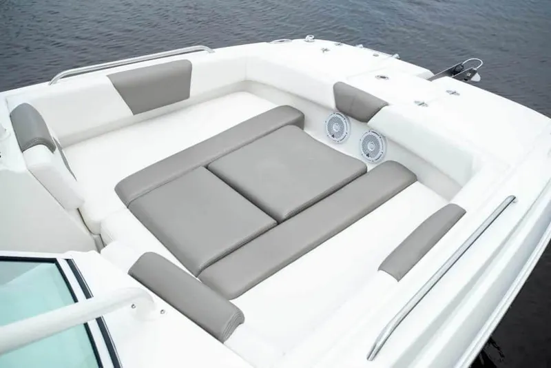 Slide: The Image of Manufacturer Provided Image: Luxurious seating area on 2026 World Cat 230 SD boat, featuring gray and white cushions. - 9