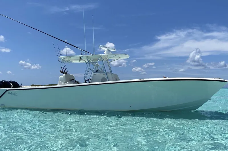 The Image of 2020 SeaVee 370Z boat on clear turquoise water under a blue sky. - 1