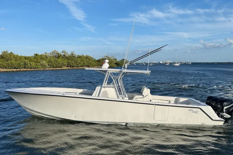 Slide: The Image of 2020 SeaVee 370Z boat cruising on a sunny day with clear skies. - 3