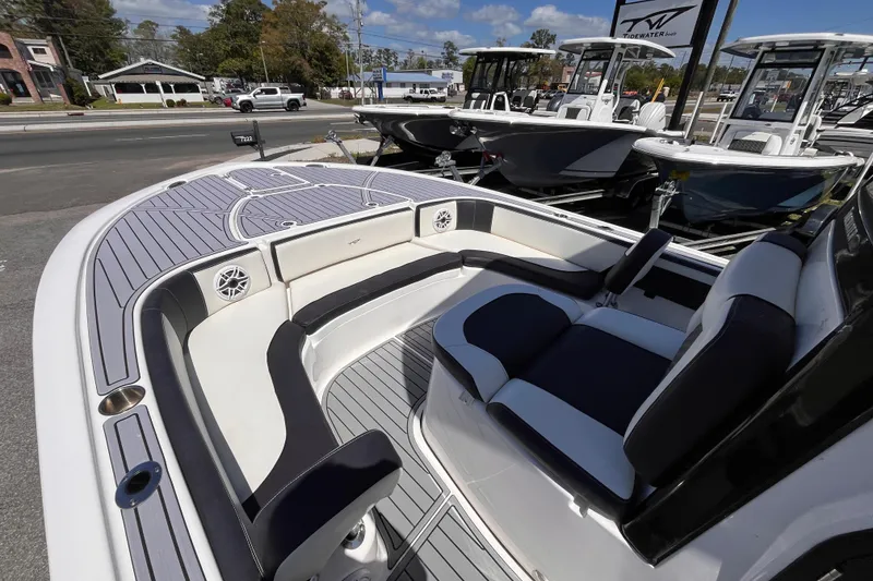 Slide: The Image of 2024 Tidewater 2700 Carolina Bay boat with sleek seating and modern design. - 14