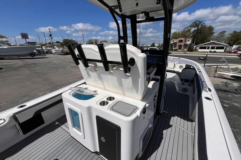 Slide: The Image of 2024 Tidewater 2700 Carolina Bay boat interior with seating and storage features. - 8