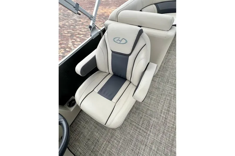 Slide: The Image of Luxurious seating on 2023 Harris Cruiser 230 boat, featuring elegant design and comfort. - 24