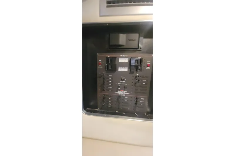 Slide: The Image of Electrical panel on a 2006 Wellcraft 330 Coastal boat. - 19