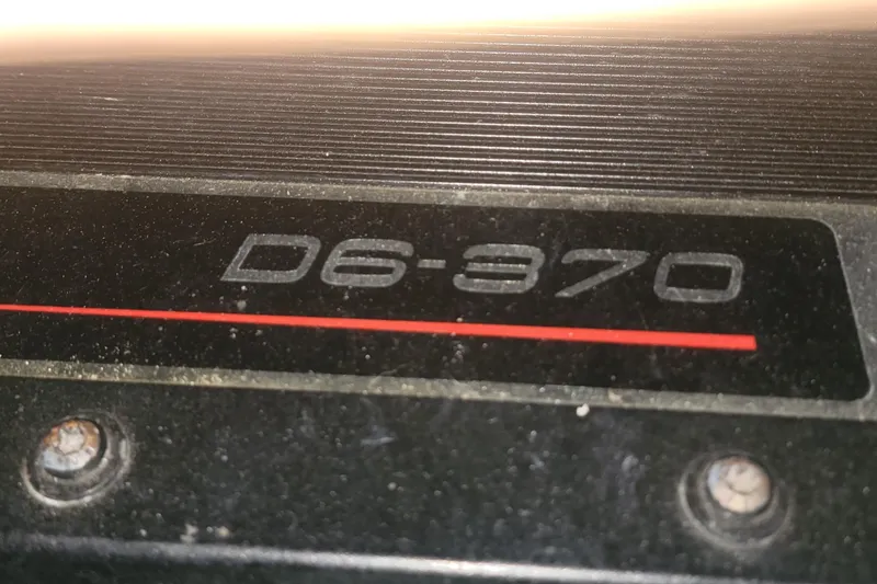 Slide: The Image of Close-up of D6-370 engine detail on 2006 Wellcraft 330 Coastal boat. - 26