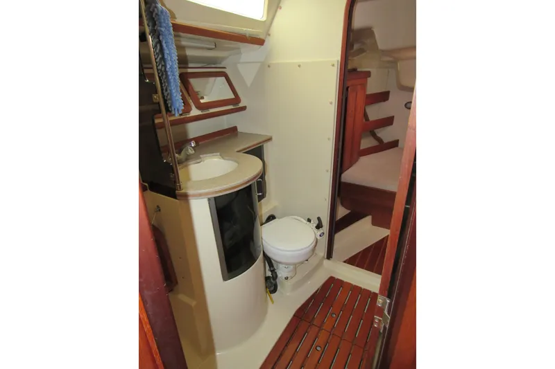 Slide: The Image of Interior of 1991 Marlow-Hunter 37.5 sailboat bathroom with sink and toilet. - 14