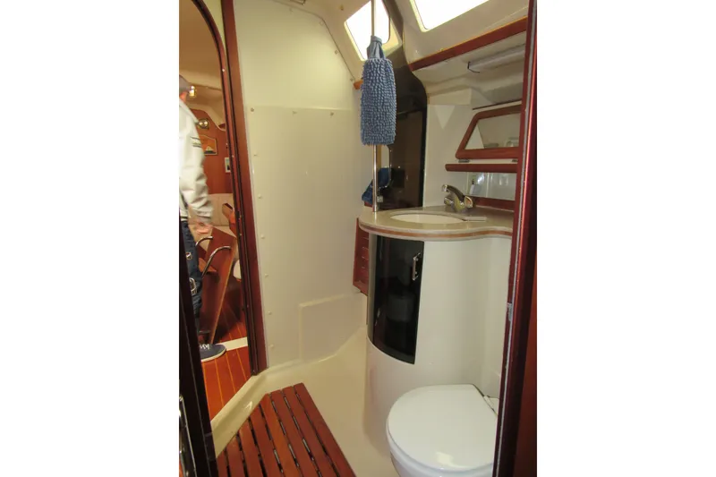 Slide: The Image of Interior of 1991 Marlow-Hunter 37.5 sailboat bathroom with sink and toilet. - 15