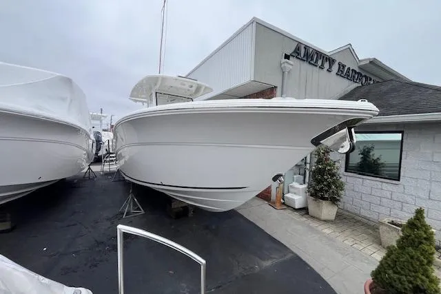 Slide: The Image of 2026 Sea Fox 288 Commander boat displayed at Amity Harbor. - 1