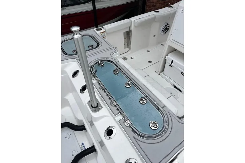 Slide: The Image of 2026 Sea Fox 288 Commander boat interior with livewell and seating area. - 4