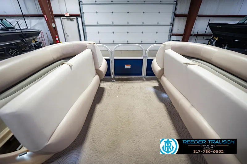 Slide: The Image of Interior view of a 2014 Sun Tracker Party Barge 20 DLX pontoon boat in a showroom. - 22