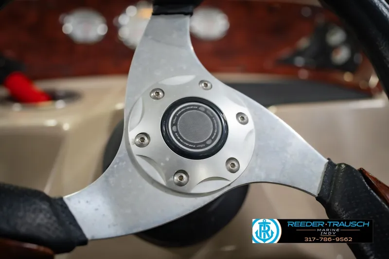 Slide: The Image of Steering wheel of a 2014 Sun Tracker Party Barge 20 DLX pontoon boat. - 29