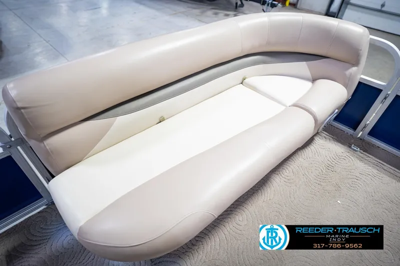 Slide: The Image of 2014 Sun Tracker Party Barge 20 DLX pontoon seating, beige upholstery, showroom display. - 40