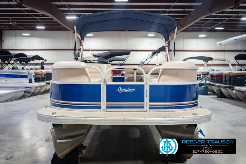 Slide: The Image of 2014 Sun Tracker Party Barge 20 DLX pontoon boat in showroom. - 5