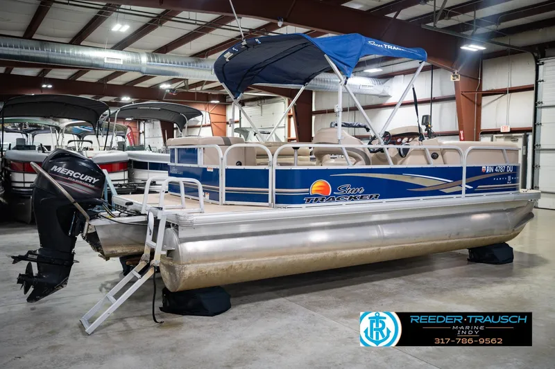 Slide: The Image of 2014 Sun Tracker Party Barge 20 DLX pontoon boat in indoor showroom. - 8