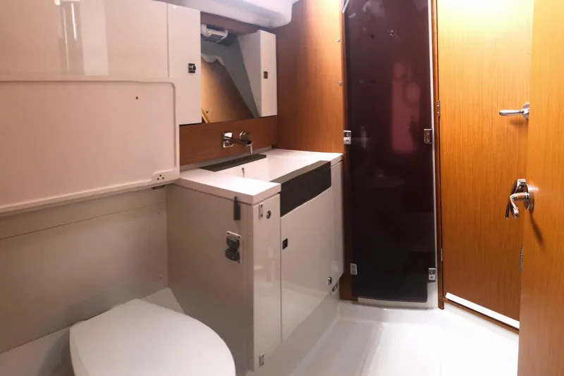 Slide: The Image of Bathroom interior of 2017 Jeanneau Sun Odyssey 41 DS yacht, featuring modern fixtures. - 16