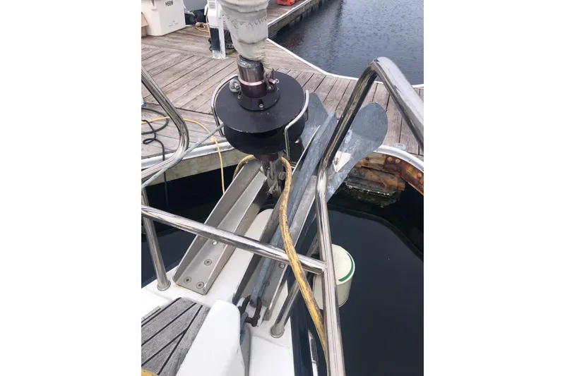 Slide: The Image of Bow of 2017 Jeanneau Sun Odyssey 41 DS yacht with anchor and dock view. - 19