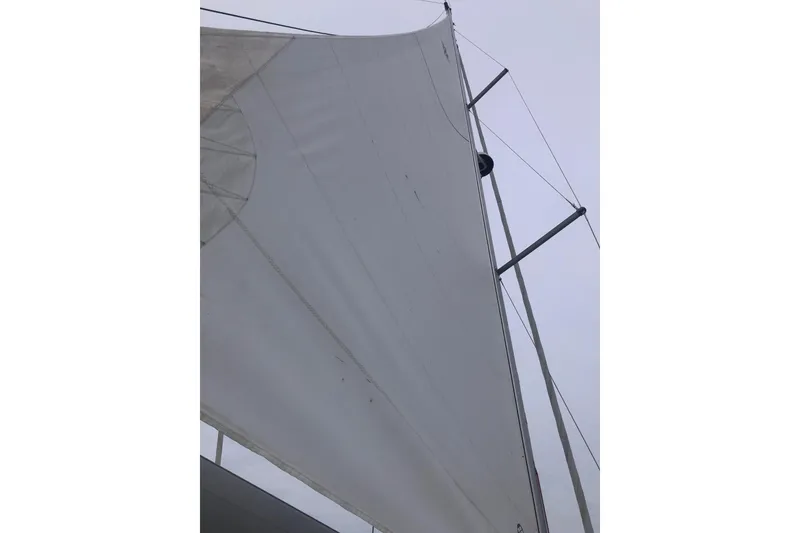 Slide: The Image of Sail of 2017 Jeanneau Sun Odyssey 41 DS yacht against cloudy sky. - 24