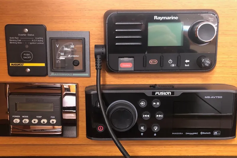 Slide: The Image of Control panel of a 2017 Jeanneau Sun Odyssey 41 DS with Raymarine and Fusion systems. - 9