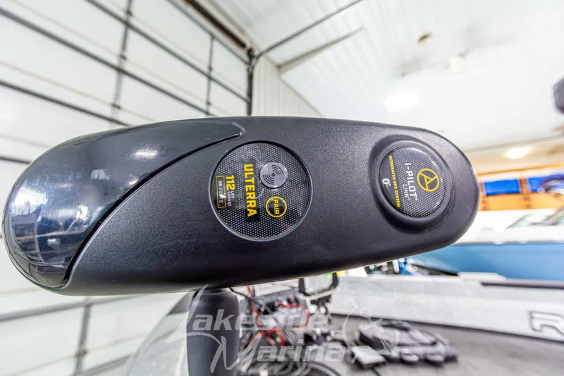 Slide: The Image of 2019 Recon 2185 SC boat with Ulterra i-Pilot trolling motor in a garage. - 10