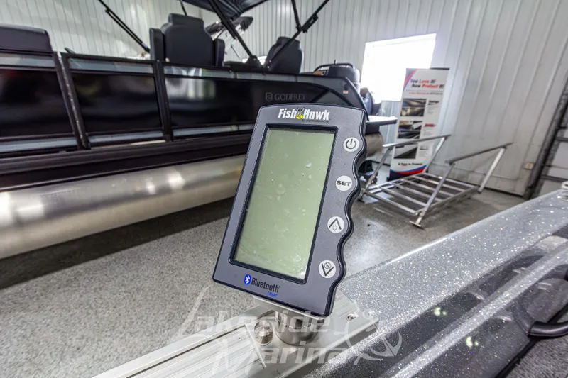 Slide: The Image of FishHawk Bluetooth device on 2019 Recon 2185 SC boat in showroom. - 18