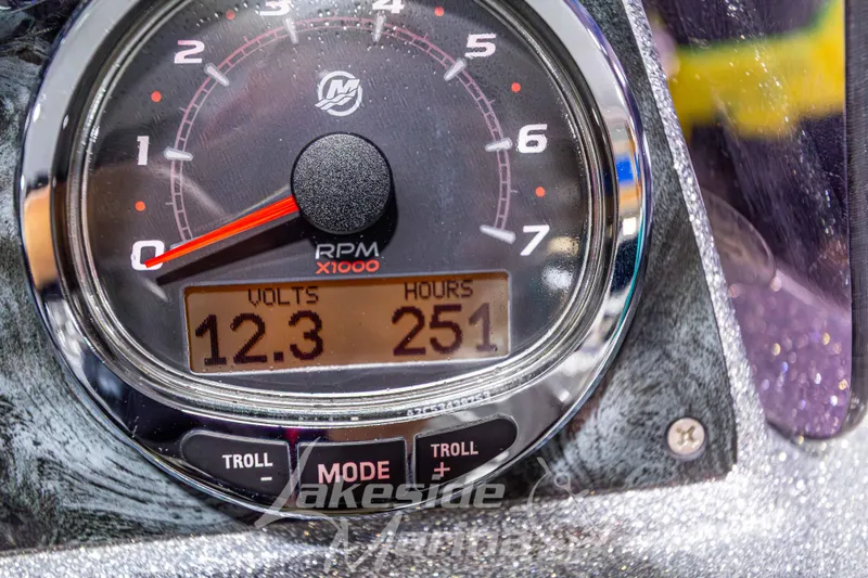 Slide: The Image of Close-up of a Recon 2185 SC 2019 tachometer displaying 12.3 volts and 251 hours. - 22