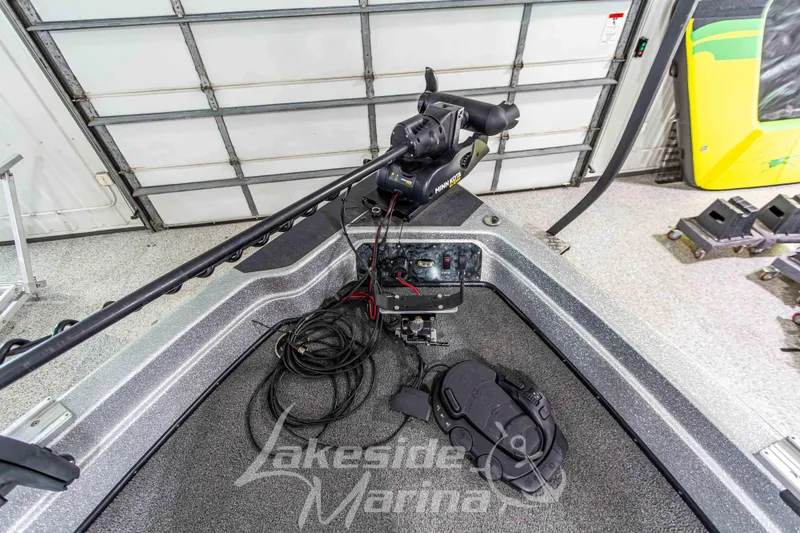 Slide: The Image of 2019 Recon 2185 SC boat interior with Minn Kota trolling motor and Lakeside Marina branding. - 30