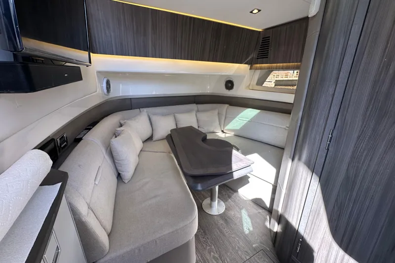 Slide: The Image of Luxurious interior of 2018 Sea Ray SLX 400 yacht with plush seating and modern design. - 22