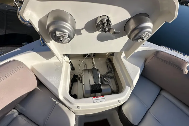 Slide: The Image of 2018 Sea Ray SLX 400 boat anchor storage compartment with hydraulic system. - 28