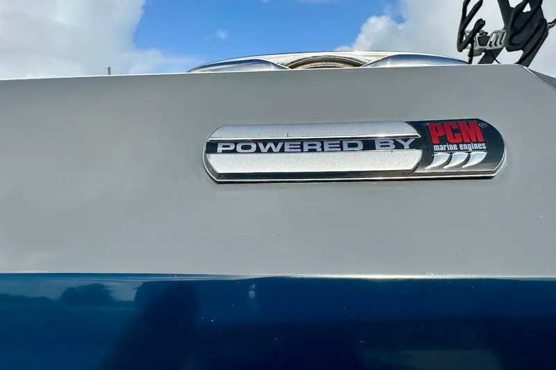 Slide: The Image of 2018 Nautique Super Air Nautique GS22 with PCM marine engine badge. - 12