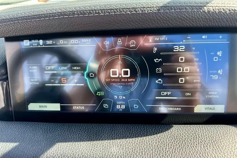 Slide: The Image of Dashboard of 2018 Nautique Super Air Nautique GS22 displaying speed and system settings. - 44