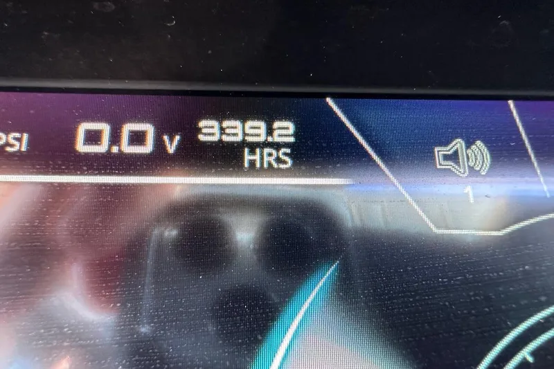 Slide: The Image of Close-up of 2018 Nautique Super Air Nautique GS22 dashboard showing 3392 hours and 0.0 volts. - 45