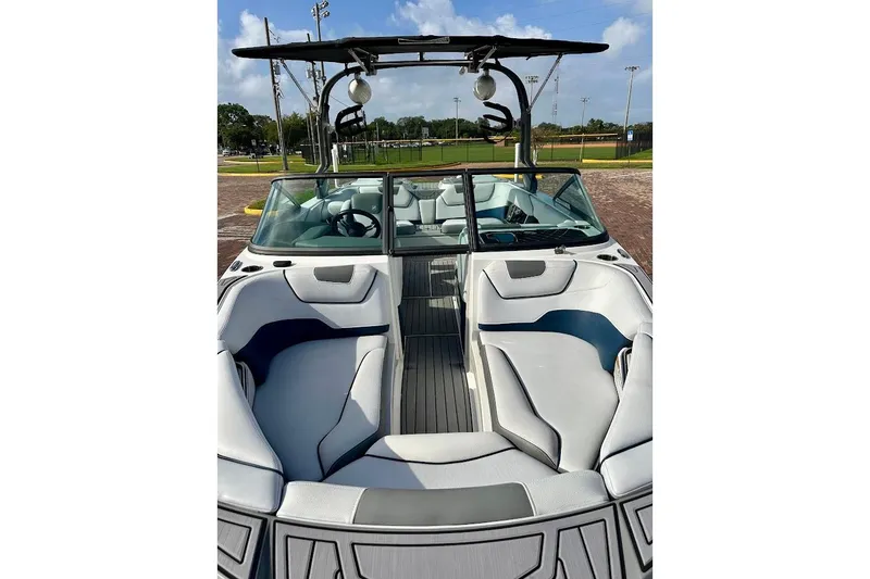Slide: The Image of 2018 Nautique Super Air Nautique GS22 boat interior with sleek seating and modern design. - 6